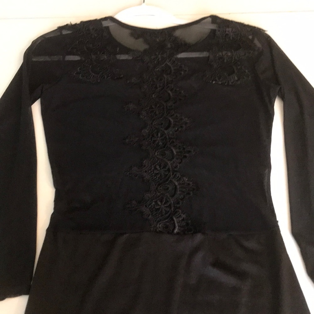 Black semi transparent stretch knit and lace.